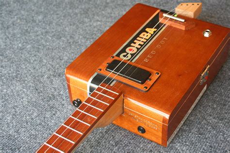 electric cigar box|left handed cigar box guitars.